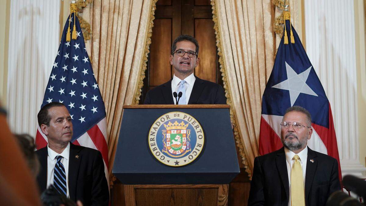 Pedro Pierluisi holds a press conference after being sworn in as governor of Puerto Rico in San Juan, Puerto Rico in 2019. He supports a debt restructuring plan designed to pull the island government out of bankruptcy that faces strong opposition.
