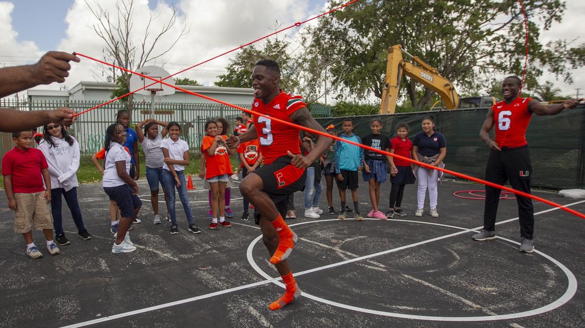 University of Miami Hurricane player Mike Harley (3) jumps rope at Tucker Elementary School in Coconut Grove on Wednesday, May 23, 2018. The players participated in a day of community service at Tucker Elementary where they interacted with kids by throwing footballs, playing basketball and hula hooping.