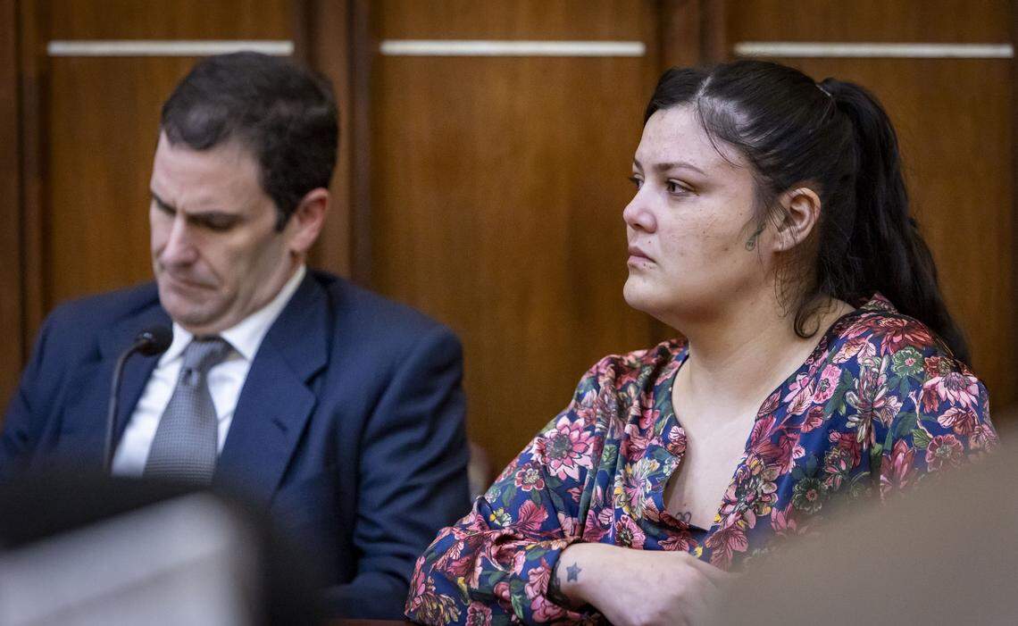 Miami, FL, October 16, 2025 - Daisy Link, right, sits quietly as the guilty verdict is read by the judge