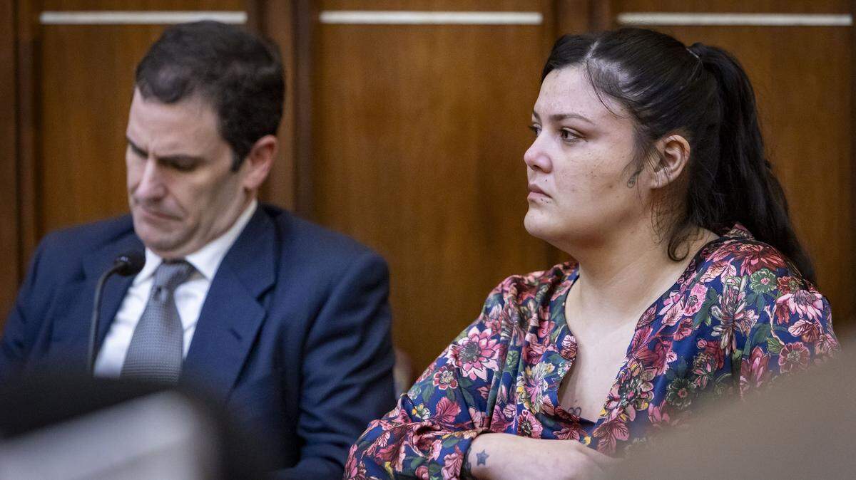Miami, FL, October 16, 2025 - Daisy Link, right, sits quietly as the guilty verdict is read by the judge