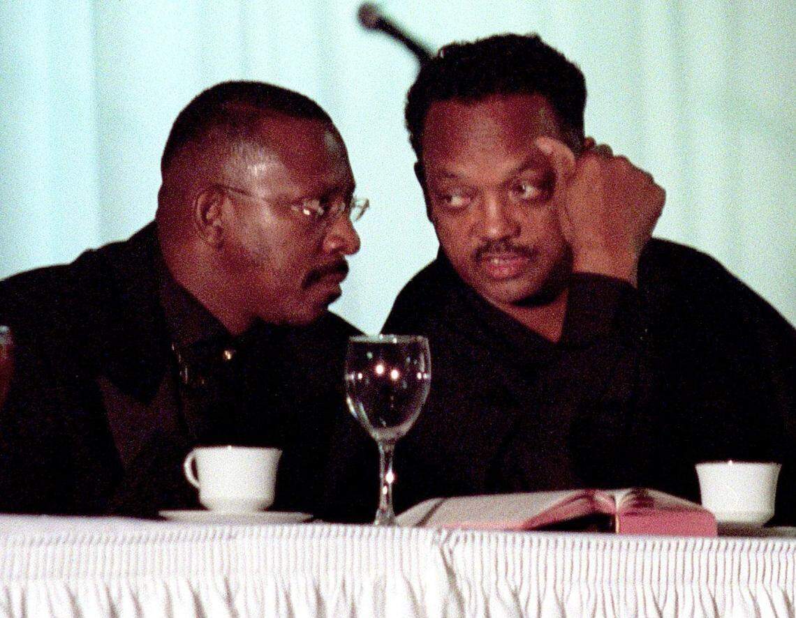 In 2001, Miami Bishop Victor T. Curry and the Rev. Jesse Jackson speak during a banquet sponsored by Vision for Victory in Miami
