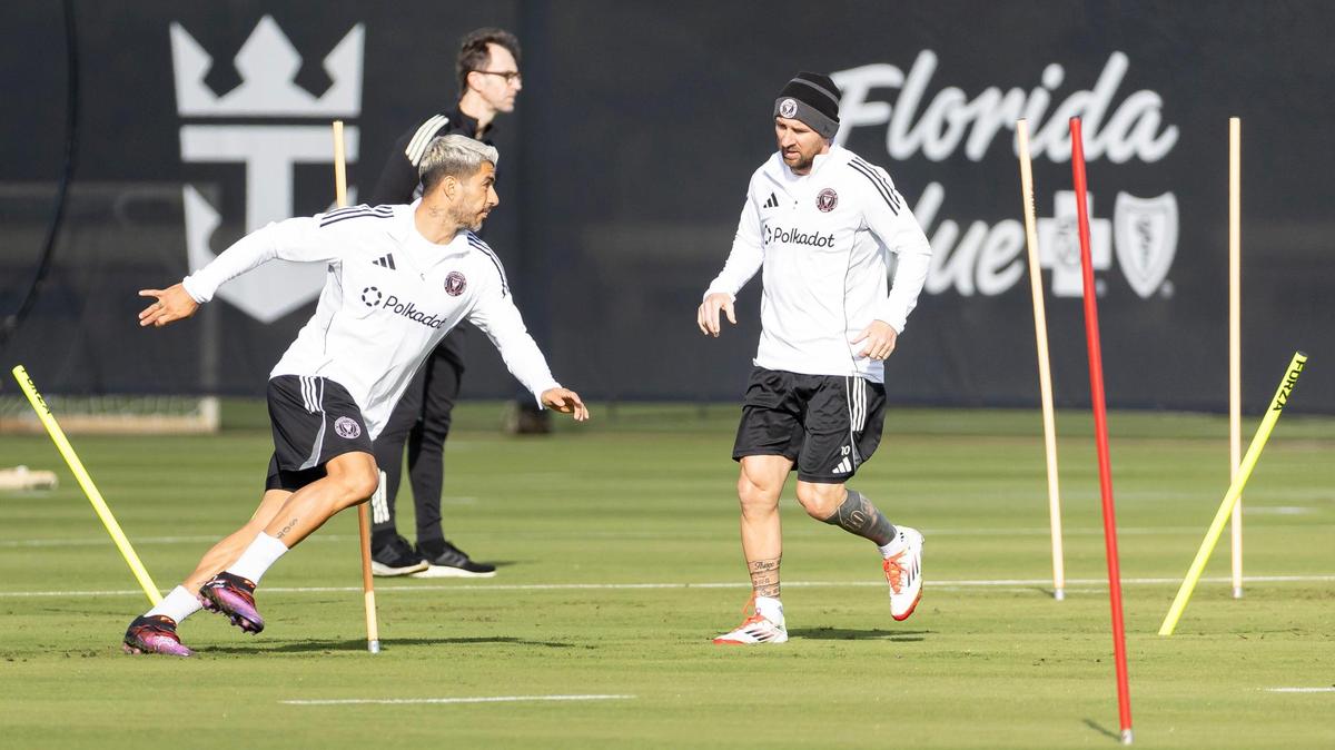 Inter Miami teammates Lionel Messi (10) and Luis Suárez (9) run drills during a team practice at the Florida Blue Training Center on Monday, Jan. 13, 2025, in Fort Lauderdale, Fla.