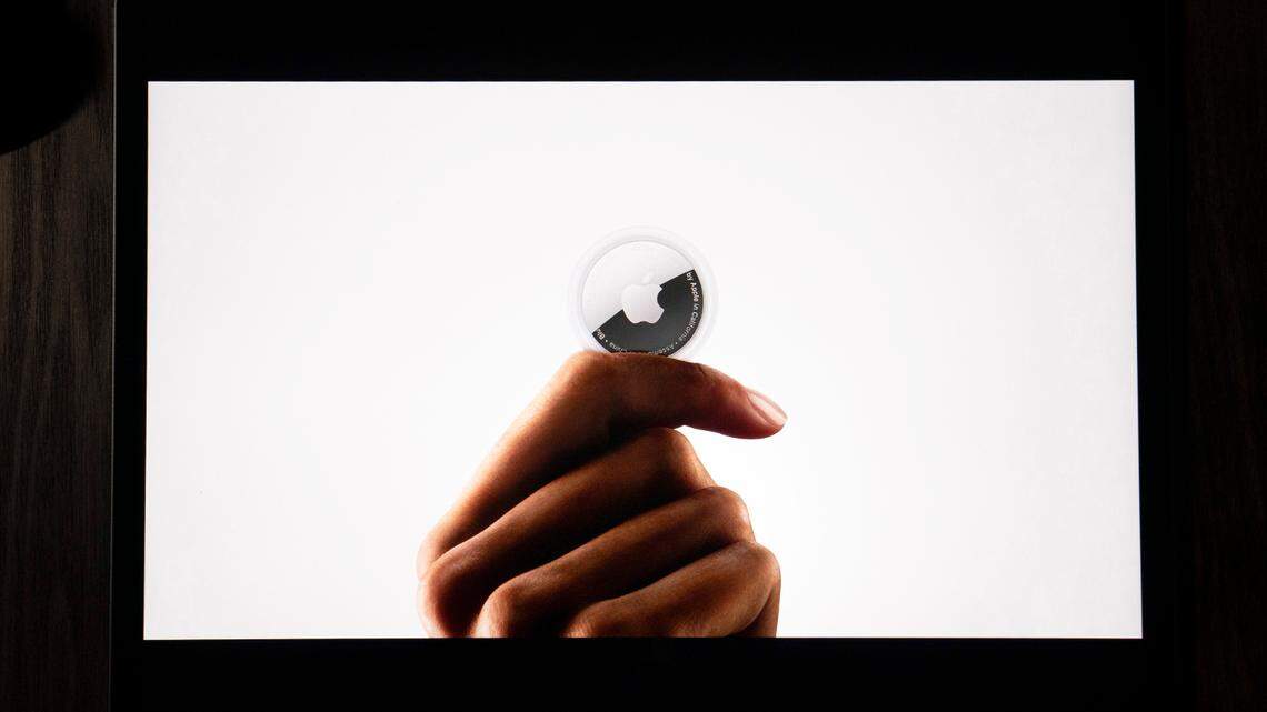In this illustration photographed in La Habra, Calif., the AirTag tracking device is introduced during a virtual event held to announce new Apple products, Tuesday, April 20, 2021. (AP Photo/Jae C. Hong)