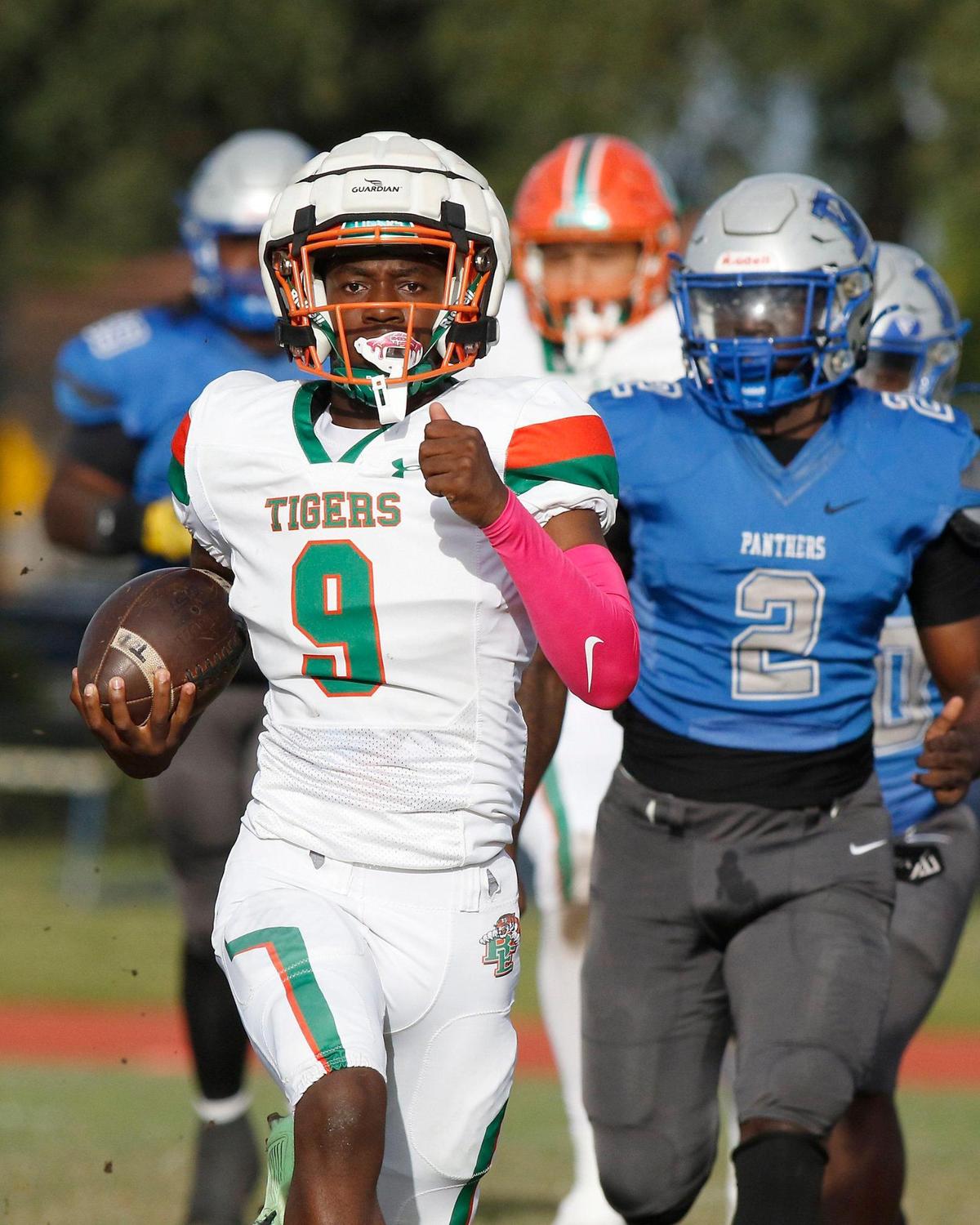 Blanche Ely Tigers quarterback Omari McNeil (9) runs to score against Dillard Panthers during football game on Saturday, October 19, 2024 at Dillard HS in Fort Lauderdale.