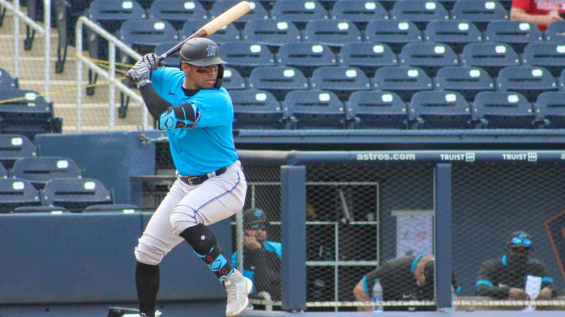 Miami Marlins infielder Luis Marte bats during spring training at the Ballpark of the Palm Beaches in West Palm Beach, Florida.