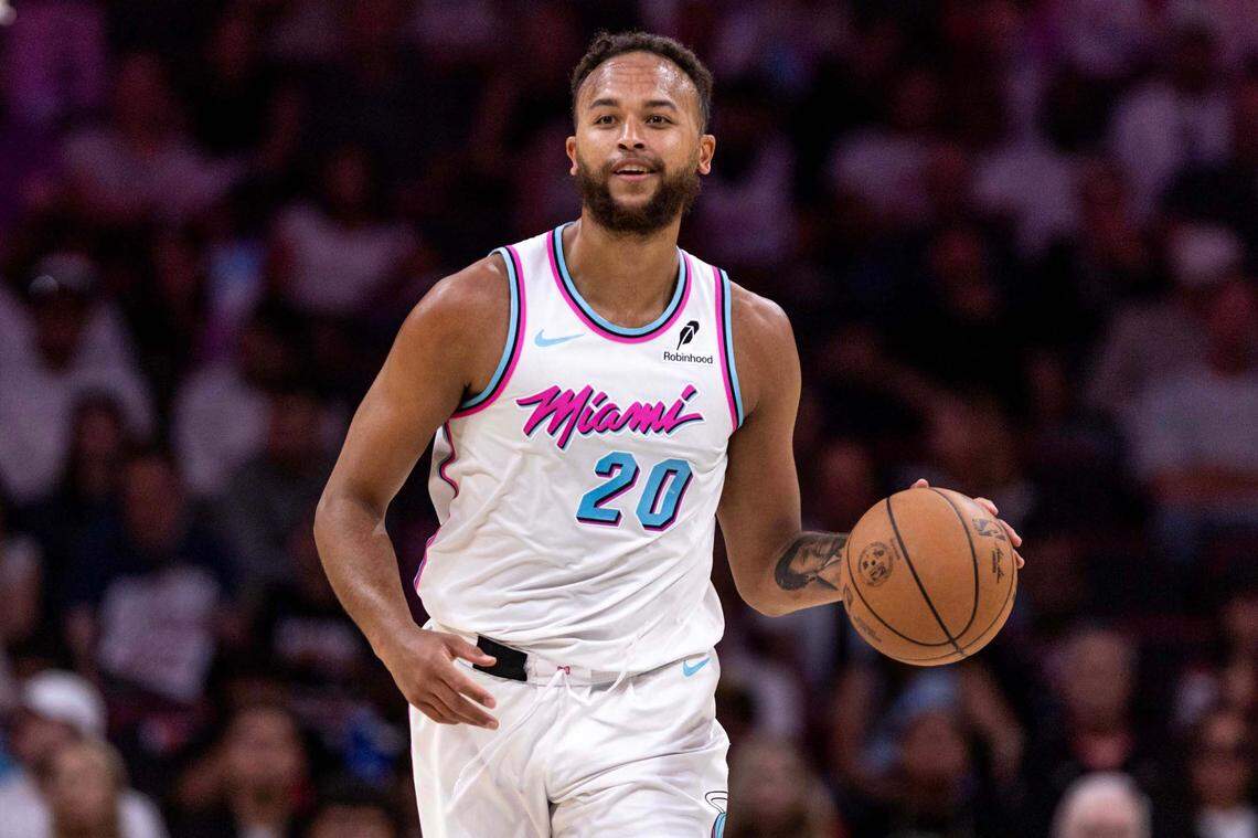 Miami Heat forward Kyle Anderson (20) dribbles down court during the second half of an NBA game against the Philadelphia 76ers at Kaseya Center on April 7, 2025, in Miami.