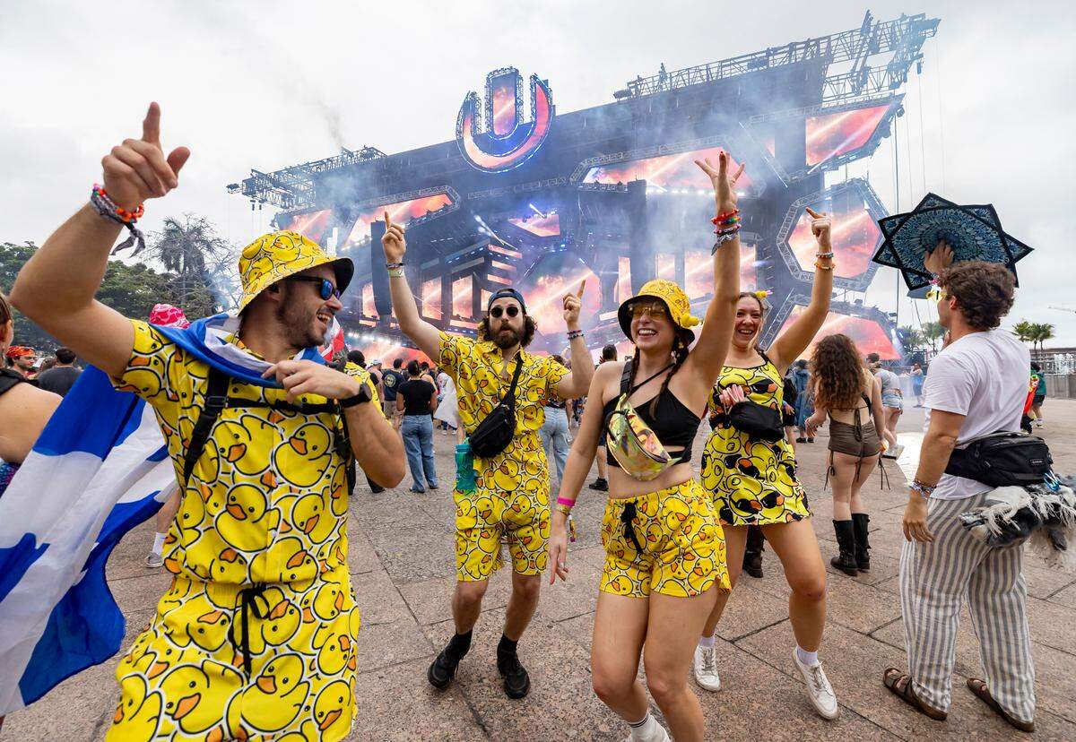 Gabriel Renaud, Cedric Noiseux, Catherine Perreault and Elizabeth Dallaire dance as Frank Walker performs during Ultra Music Festival’s 25th anniversary at Bayfront Park on Saturday, March 29, 2025, in downtown Miami, Fla.