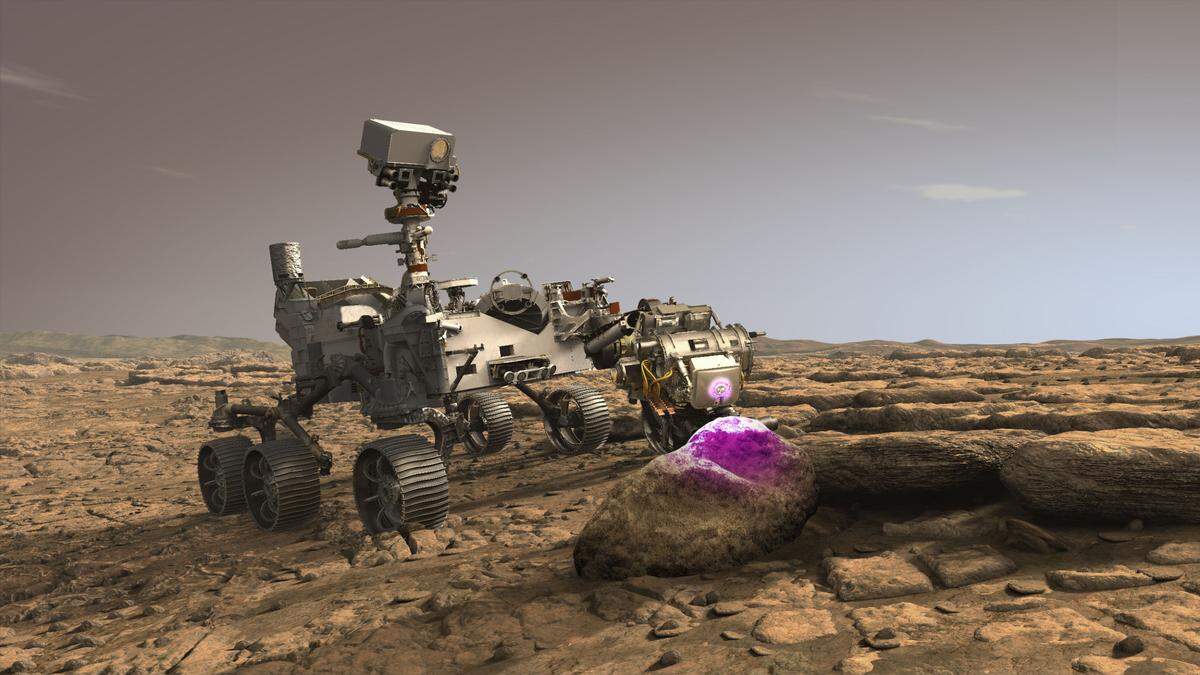 Esta ilustración muestra el rover Perseverance Mars de la NASA usando el Instrumento Planetario para Litoquímica de Rayos X (PIXL).