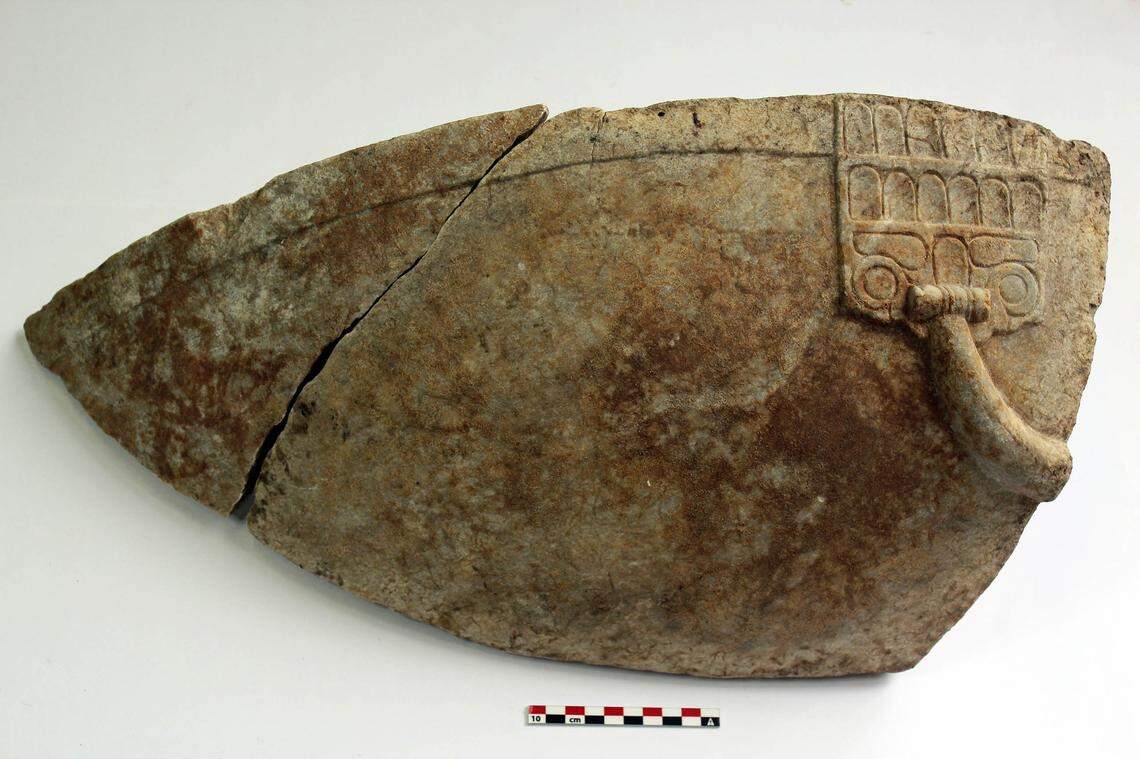 Part of a marble vessel found at the archaeological site.