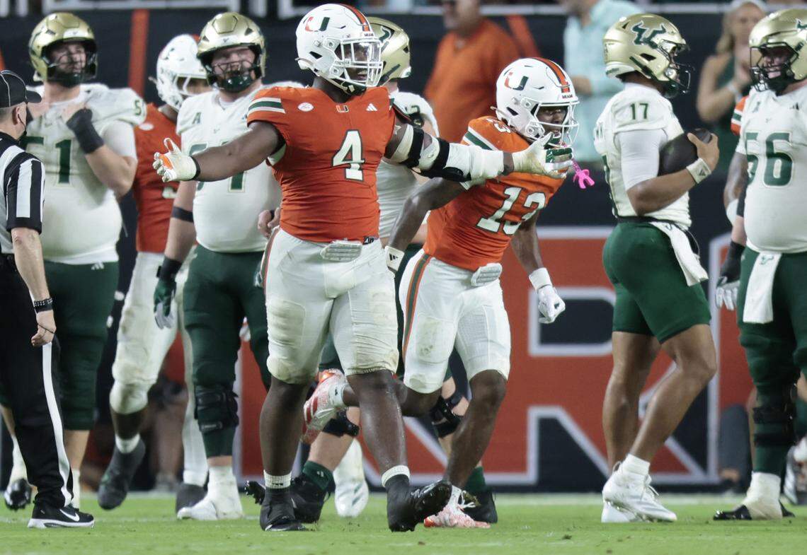 Miami Hurricanes defensive lineman Rueben Bain Jr. (4) reacts after stopping South Florida Bulls quarterback Byrum Brown (17) in the second half of their NCAA football game at Hard Rock Stadium in Miami Gardens, Florida, on Saturday, September 13, 2025.