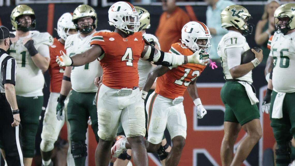 Miami Hurricanes defensive lineman Rueben Bain Jr. (4) reacts after stopping South Florida Bulls quarterback Byrum Brown (17) in the second half of their NCAA football game at Hard Rock Stadium in Miami Gardens, Florida, on Saturday, September 13, 2025.