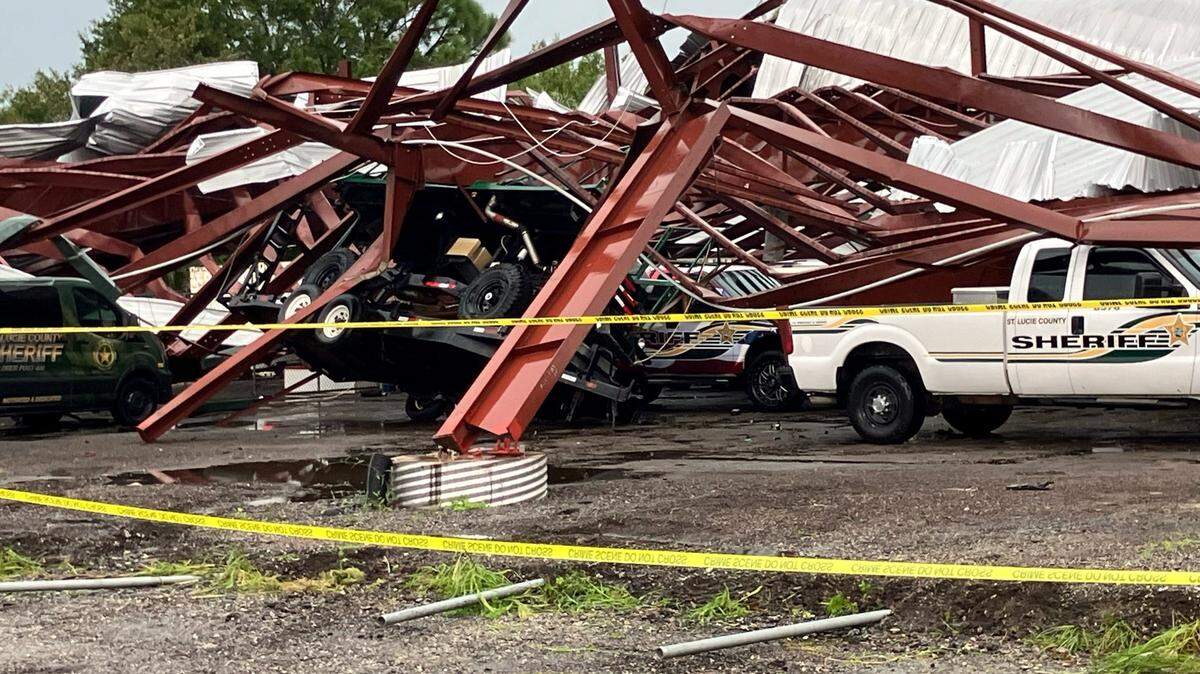 A suspected tornado flattened this steel storage building at the St. Lucie County Sheriff’s Office complex on Midway Road on Wednesday, Oct. 9, 2024.