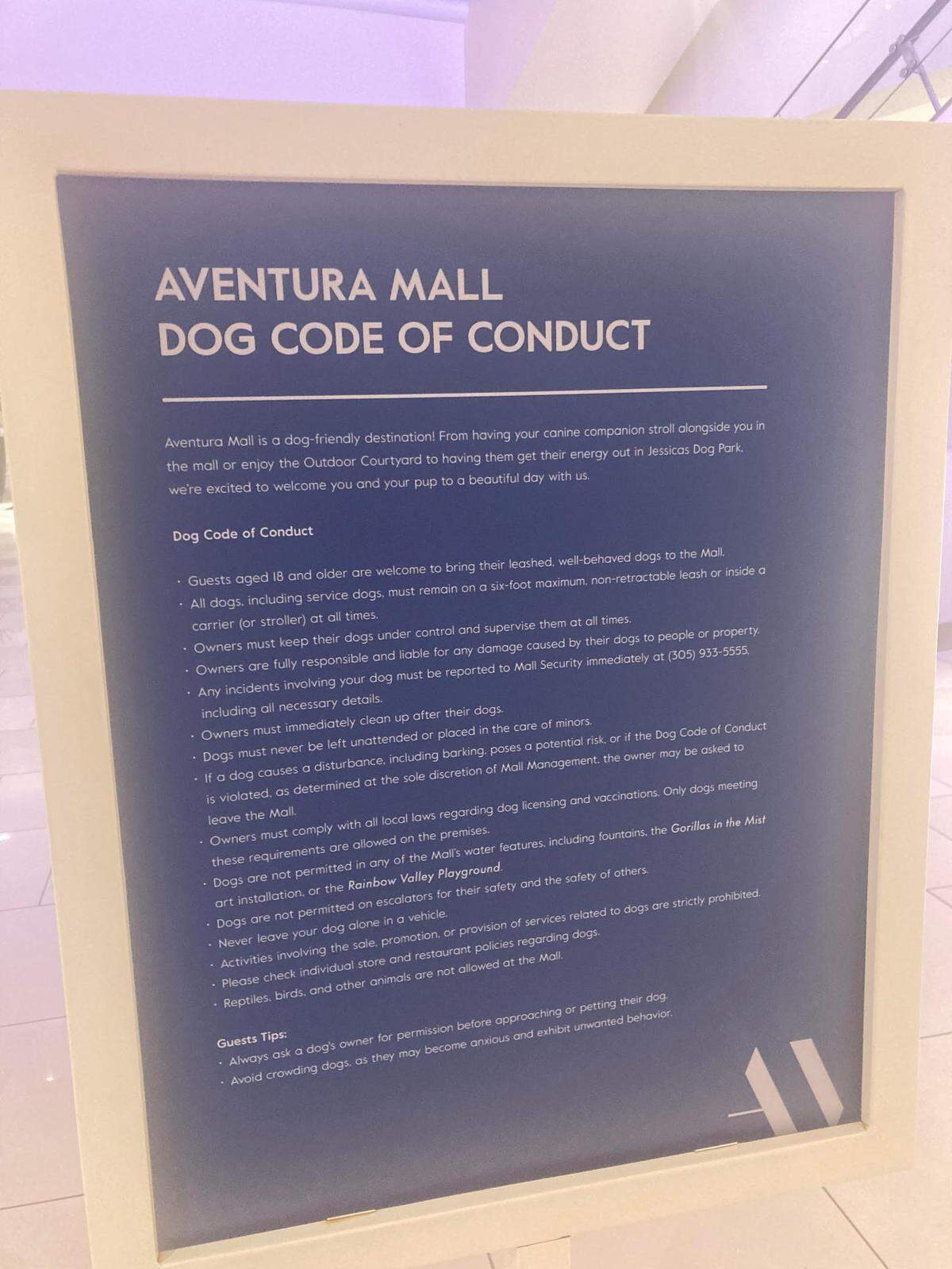 A sign with the dog rules at Aventura Mall