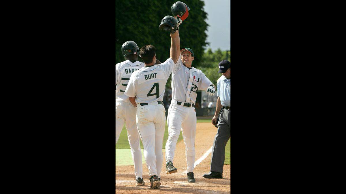 In this June 5, 2004, file photo, the University of Miami’s Gaby Sanchez celebrates at home plate after hitting a home run.