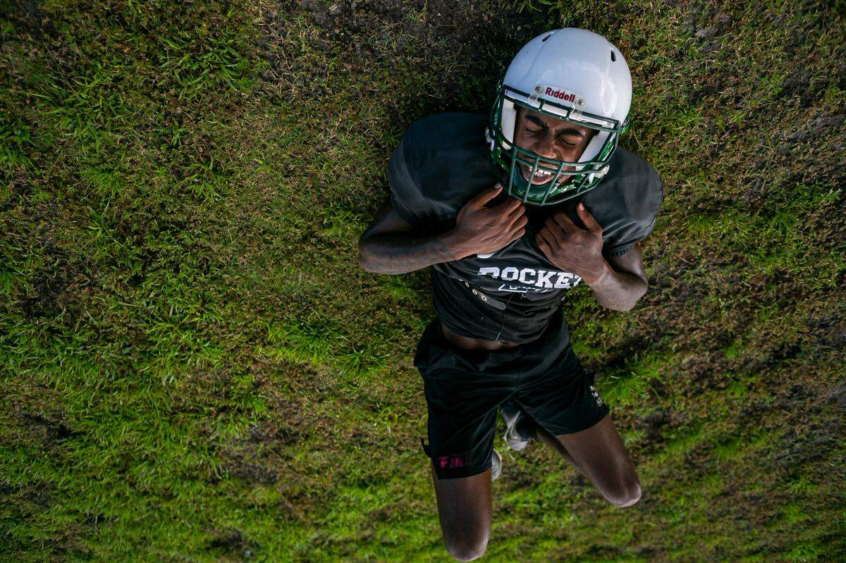 Miami Central football player Anthony Rose runs drills during a preseason practice at his school’s field in Miami’s West Little River neighborhood on Thursday, August 5, 2021.