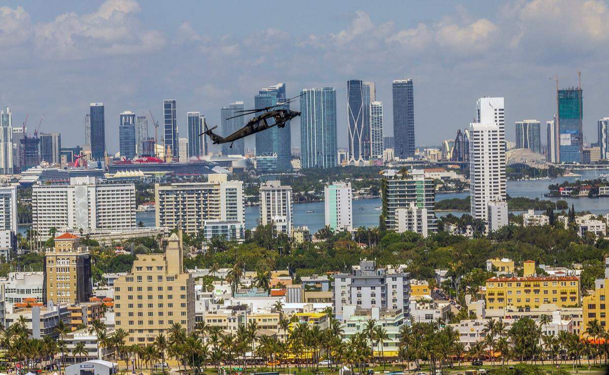 An 8-229th Assault Helicopter Battalion (AHB) aircraft from Fort Knox, Ky., flies over South Beach during a practice run for the Hyundai Air & Sea Show, which returns to Miami Beach for its annual National Salute to America’s Heroes, Friday, May 23, 2025.
