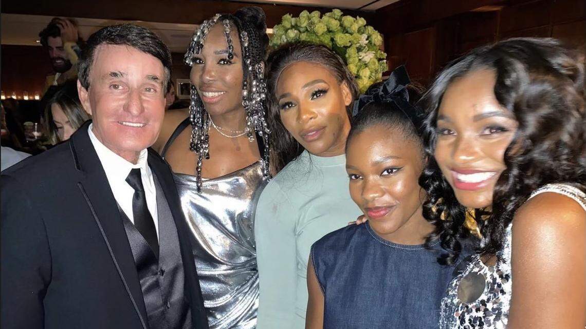 Boca Raton tennis coach Rick Macci (far left) at the movie premiere of “King Richard” with his former students, Venus and Serena Williams, and the actresses who played them in the movie.