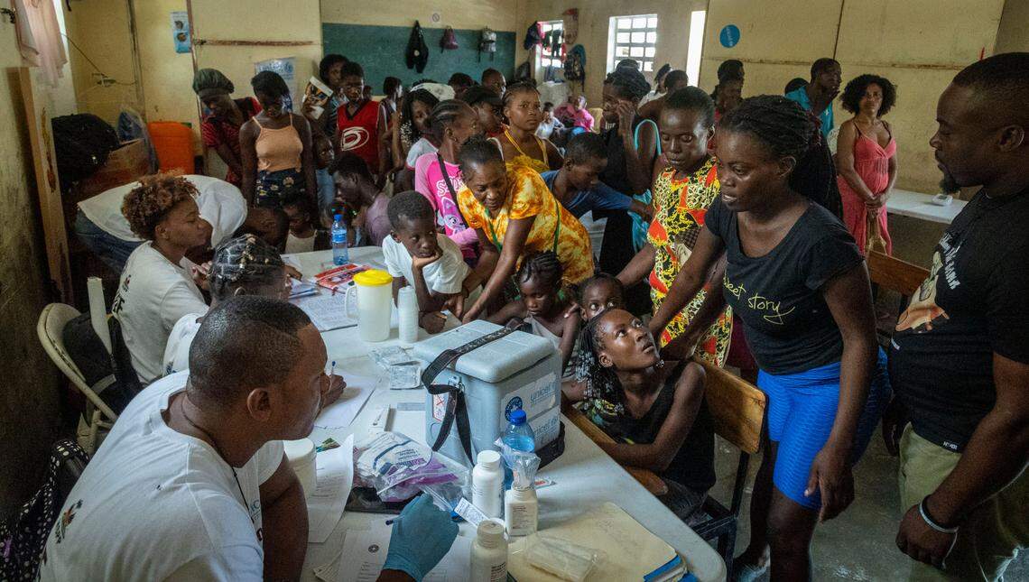 Displaced residents of Port-au-Prince line up to get medical attention at the Ecole National Joseph C. Bernard DeFreres displacement camp. More than 1.4 million Haitians have been forced to leave their homes due to gang violence and have taken refuge in several locations in Port-au-Prince.