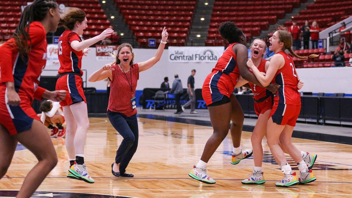 Westminster Academy head coach Shannon Wallhoff joins players on the court after the team defeats Cardinal Mooney in a Class 3A girls basketball state championship at the RP Funding Center in Lakeland on Friday, February 25, 2022.