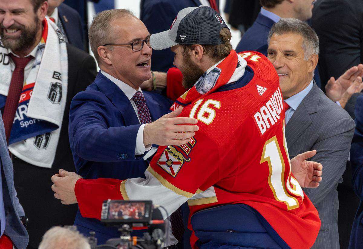 Florida Panthers head coach Paul Maurice and Panthers owner Vincent J. Viola celebrate with Aleksander Barkov (16) after the Panthers defeated the Edmonton Oilers in Game 7 of the NHL Stanley Cup Final at the Amerant Bank Arena on Monday, June 24, 2024, in Sunrise, Fla.