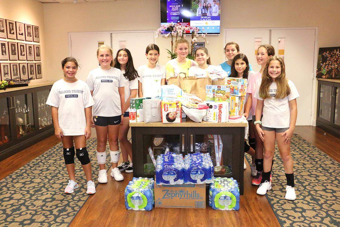 The Palmer Trinity School community recently partnered with Christ Episcopal Church and the Episcopal Diocese of Southeast Florida to donate more than $10,500 to Hurricane Dorian relief efforts in Grand Bahama Island. The students from left to right, are Olivia Balarezo, Anabella Dodd, Meah Garcia, Elsa Gray, Angelina Lambrou, Marielle Lopez Negrete, Veronica Maza, Eloise Miles, Veronica Segredo, Vale Touron, Eva Van Heel and Mai Vedani.