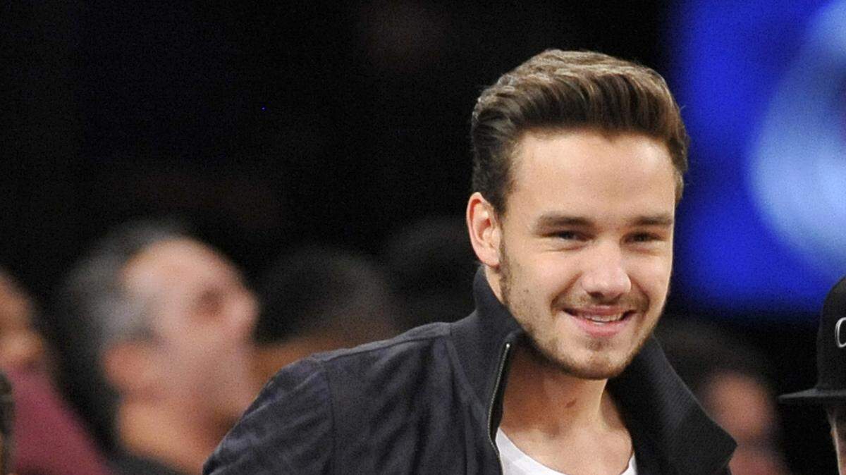 Dec 6, 2013; New York, NY, USA; Recording artist Liam Payne of One Direction looks on during the second half of the game between the New York Knicks and the Orlando Magic at Madison Square Garden. The Knicks won the game 121-83. Mandatory Credit: Joe Camporeale-USA TODAY Sports