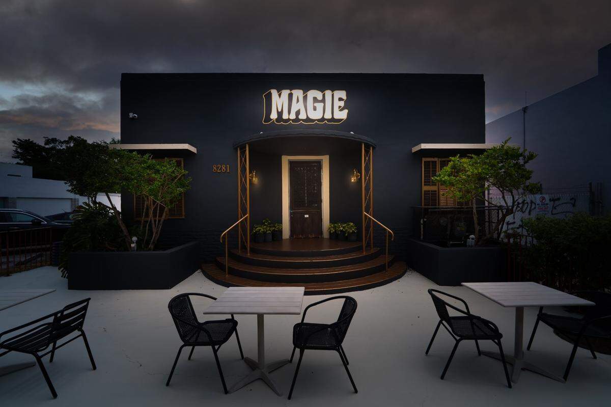 The exterior of Magie, a wine bar and gathering spot in Miami.