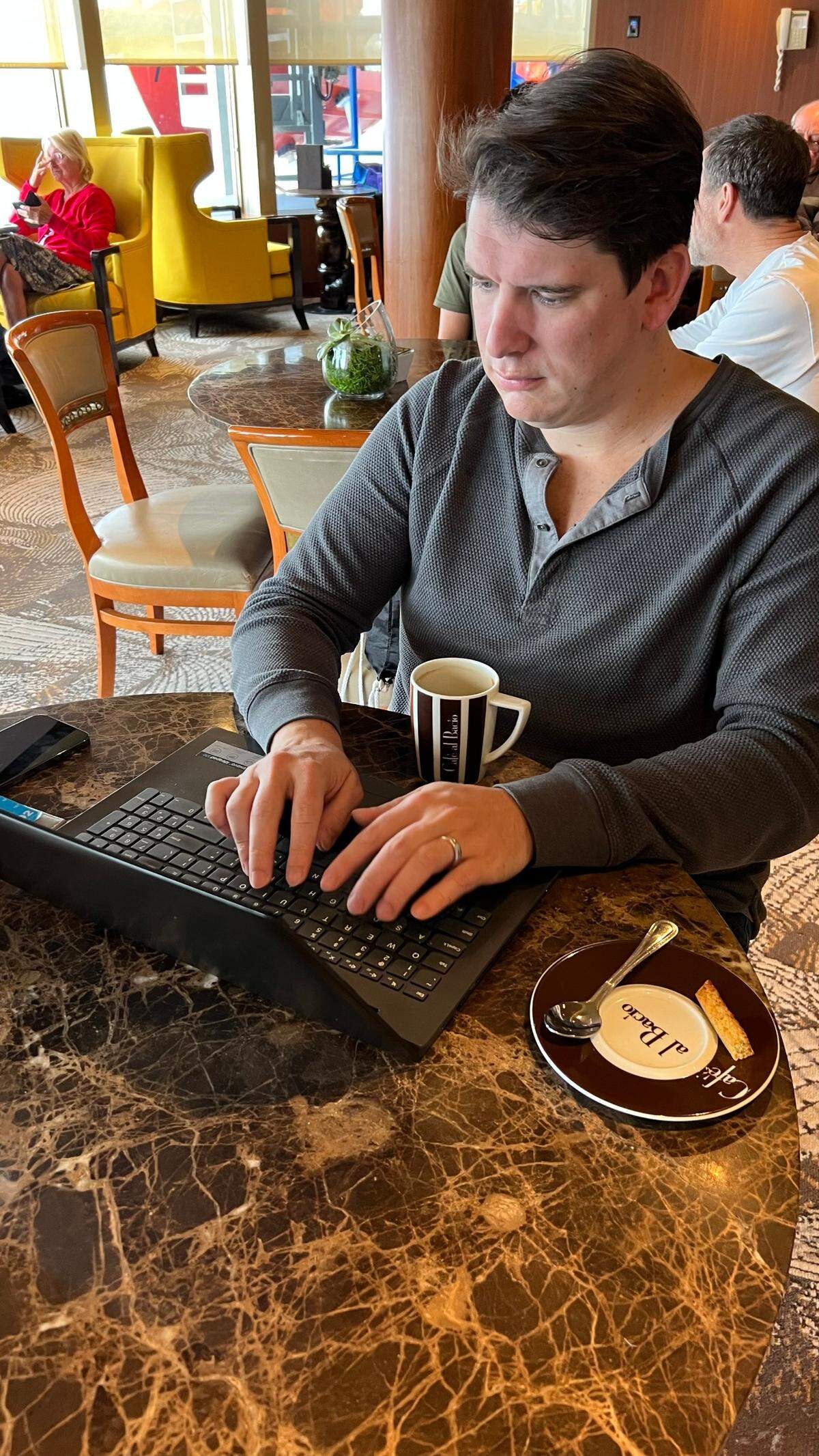 Jordan Taylor is working from a cafe on the ship.