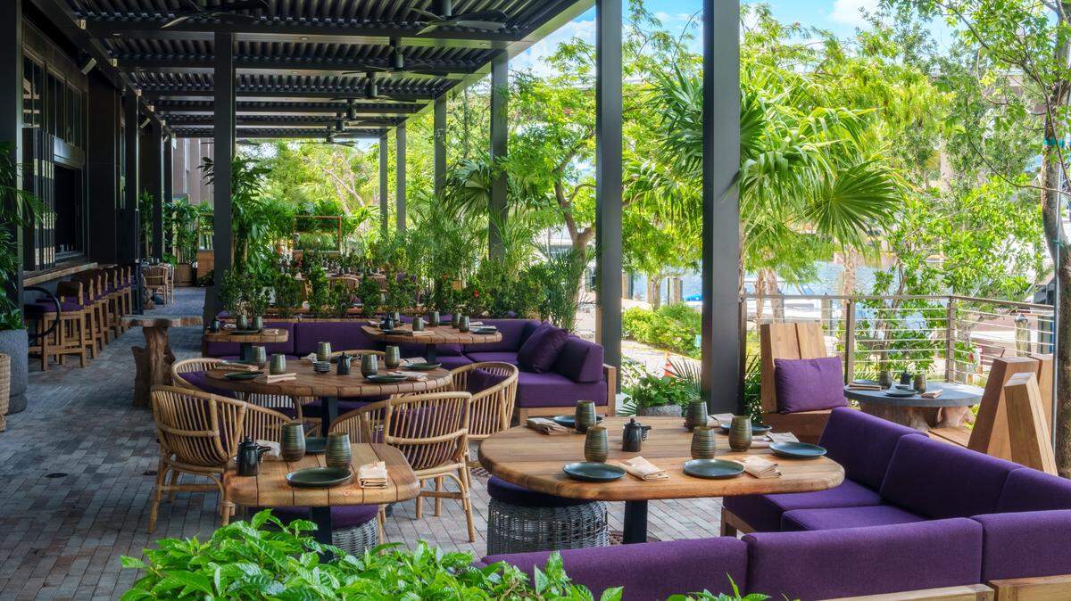 The shaded outdoor dining area at the new Tanuki restaurant on the Miami River.