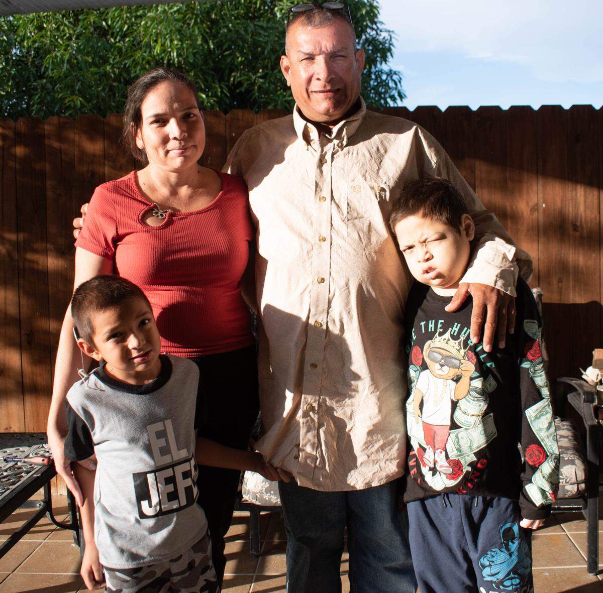 Milagro Guardado and Luis Balmaceda with their two sons, Alfonso and Cleveland.