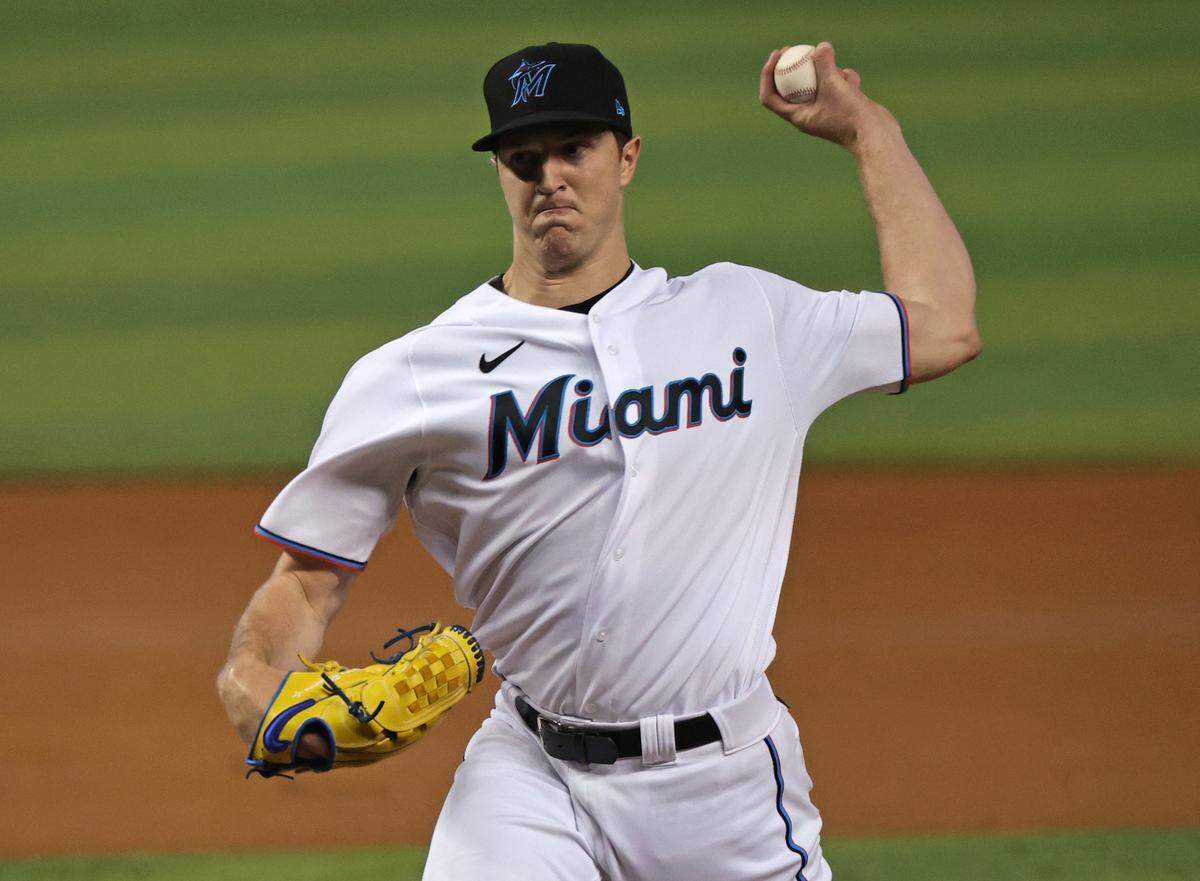 Miami Marlins pitcher Trevor Rogers (28) pitches against the Colorado Rockies during the first inning of their baseball game at loanDepot park on Thursday, June 10, 2021 in Miami, Florida.