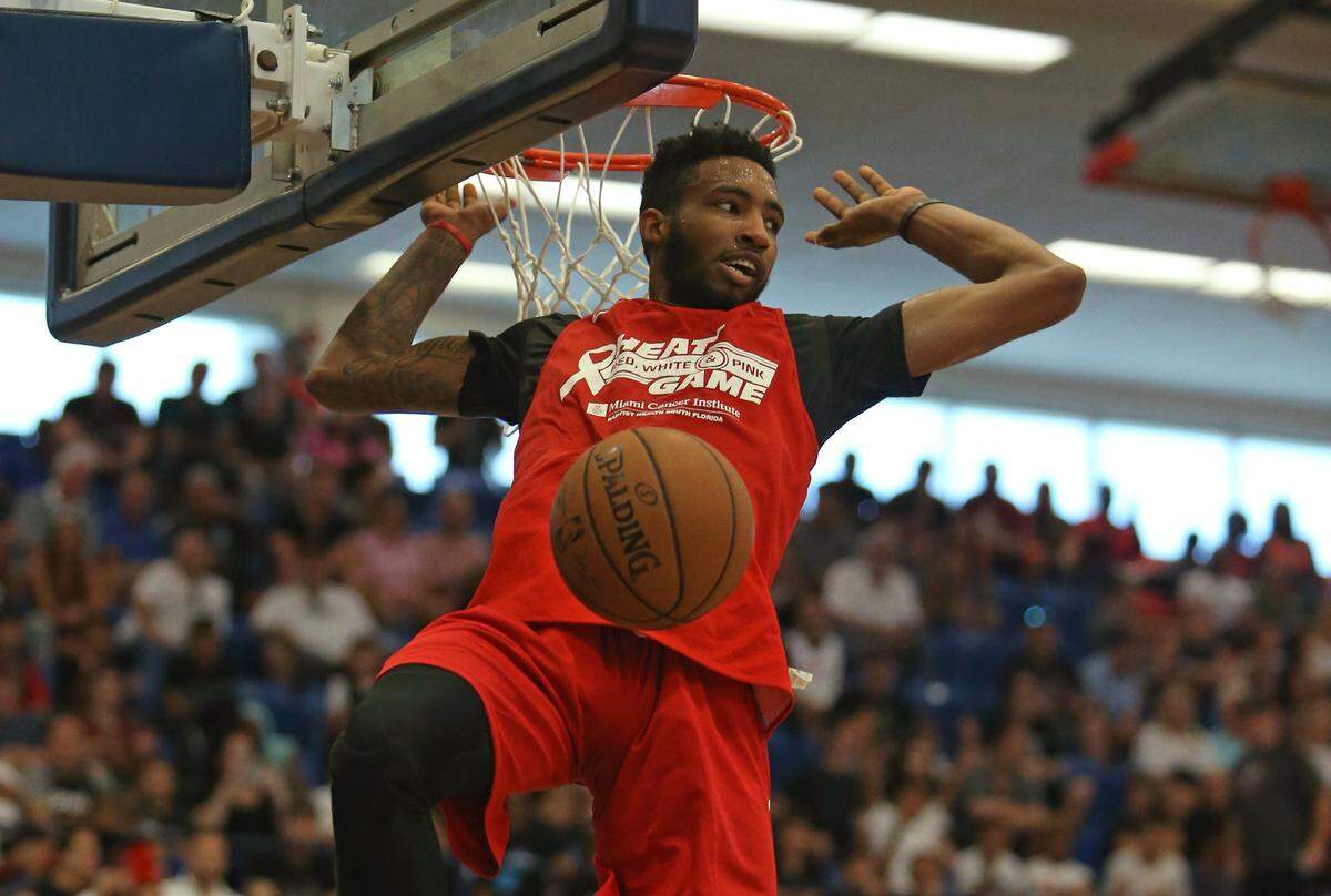 Miami Heat forward Derrick Jones Jr. dunks during second quarter of the HEAT Red, White & Pink scrimmage game at FAU Arena on Saturday, September 29, 2018 in Boca Raton, FL. The HEAT “Red, White & Pink” Game benefiting Miami Cancer Institute at Baptist Health South Florida.