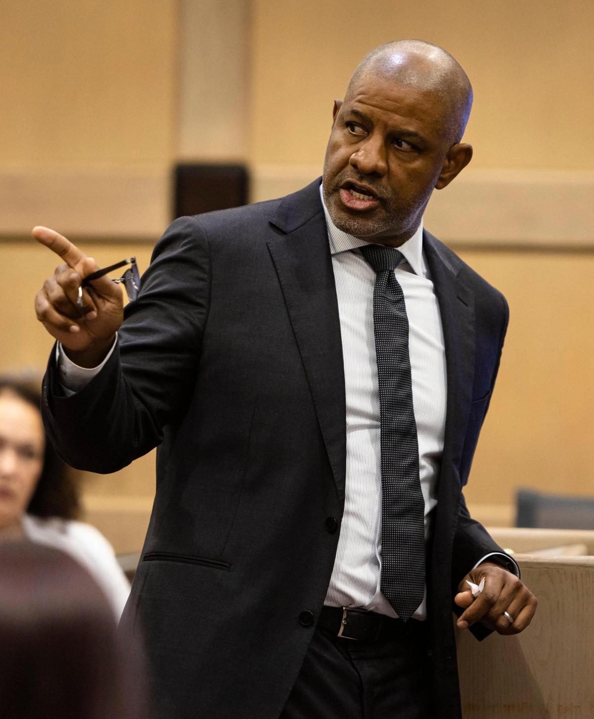 Defense Attorney David Howard points toward his client, Jamell Maurice Demons, known professionally as YNW Melly, as he speaks to the jury during opening statements at Melly’s double murder trial on Monday, June 9, 2023, in a Fort Lauderdale court.