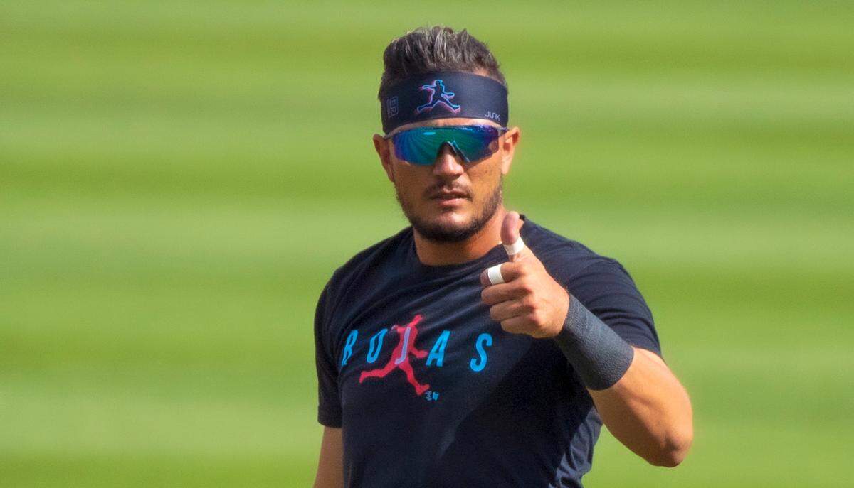 Miami Marlins shortstop Miguel Rojas (19) thumbs up during fielding practice before the start of their spring training baseball game against the New York Mets at Roger Dean Chevrolet Stadium on Wednesday, March 17, 2021 in Jupiter, Florida.