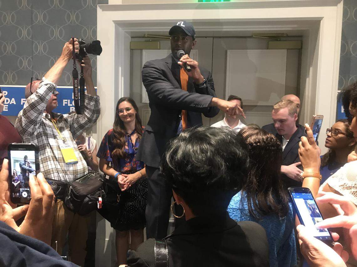 Andrew Gillum talks to a crowded room at Disney’s Yacht Club Convention Center Friday, June 7, about registering voters and beating Donald Trump in 2020.