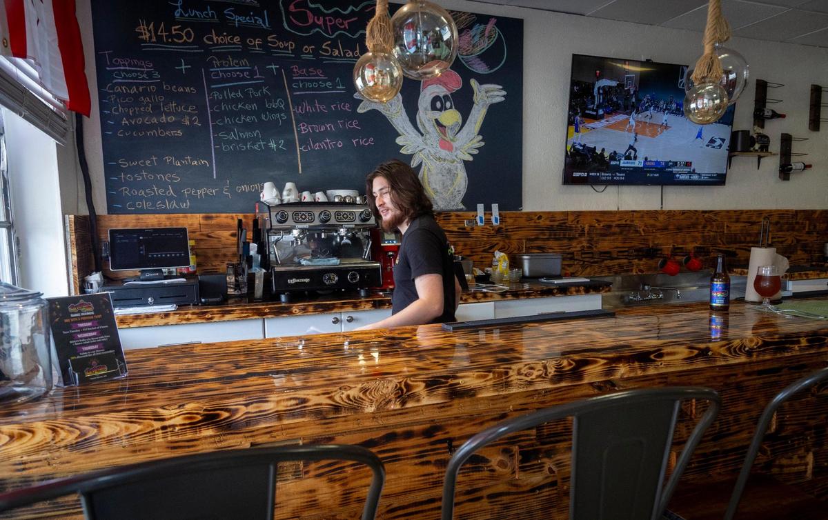 Restaurant manager Ethan Southern behind the counter at La Veridica BBQ in Hialeah.