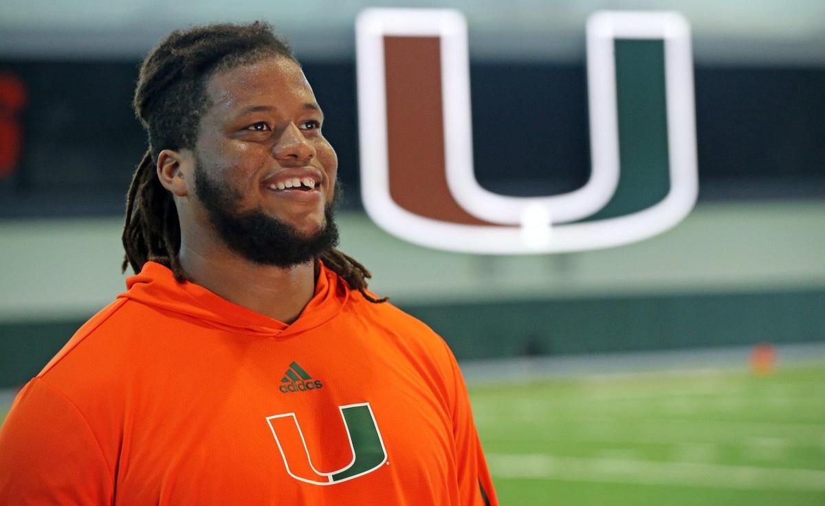Miami Hurricanes defensive lineman Jordan Miller meets with reporters after practice at the University of Miami’s Greentree Practice Field in Coral Gables on Thursday, April 7, 2022.