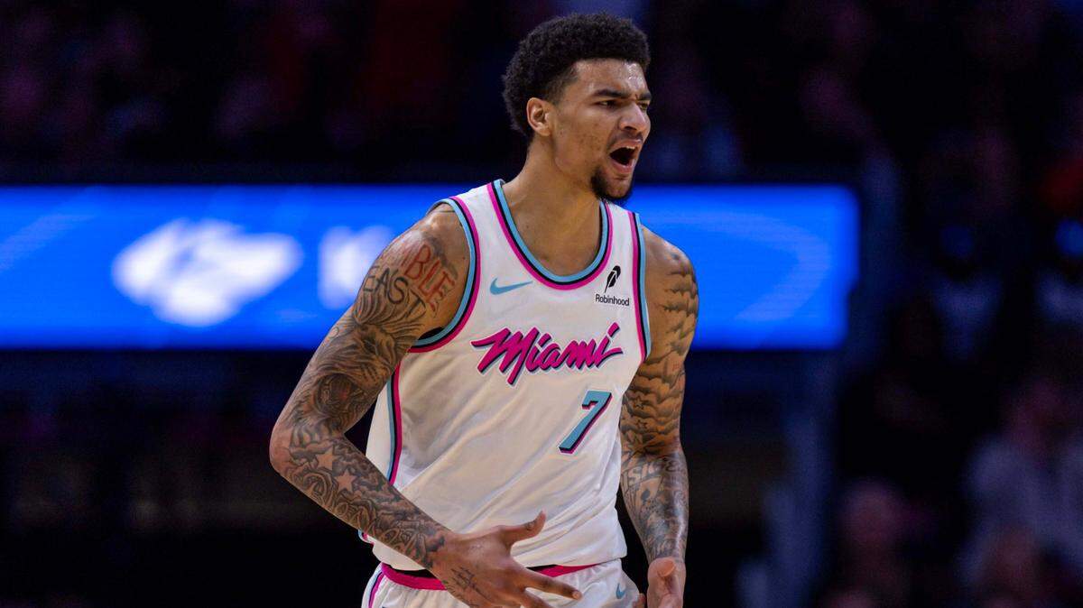 Miami Heat center Kel’el Ware (7) reacts to hitting a three-pointer during the second half of an NBA game against the Orlando Magic at Kaseya Center on January 27, 2025, in Miami.