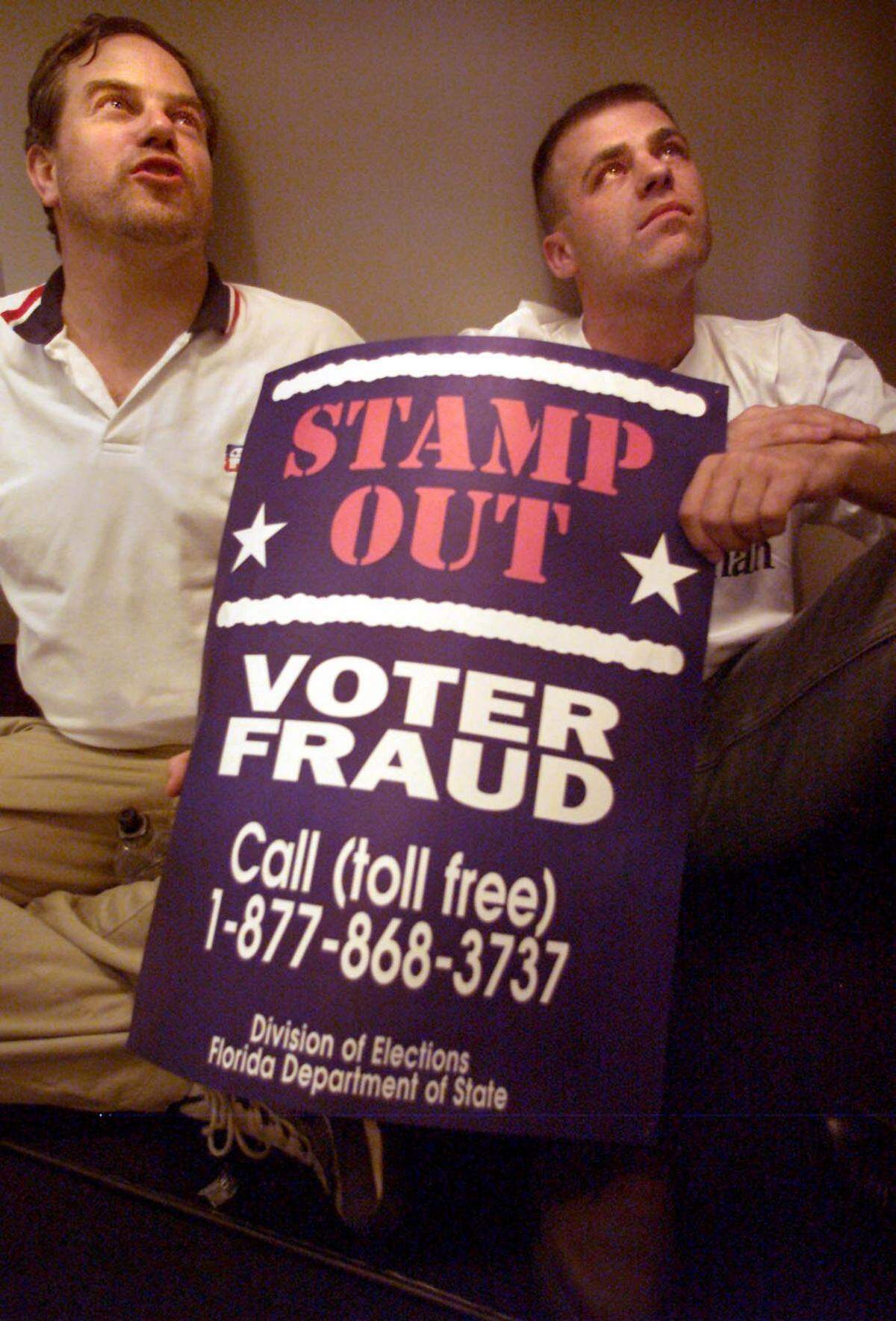 Two Republican Party observers from New York, Brendan Quinn, left, and Bruce Tague, joined the sit-in outside the Miami-Dade County elections office. They demanded to be allowed to observe the counting of ballots, November 22, 2000.