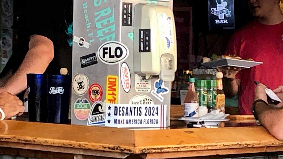 At Rick’s Reef in St. Pete Beach, Florida, your summer vacation dining view includes the bumper sticker “DeSantis 2024 Make America Florida” promoting the governor’s possible run for the U.S. presidency. 