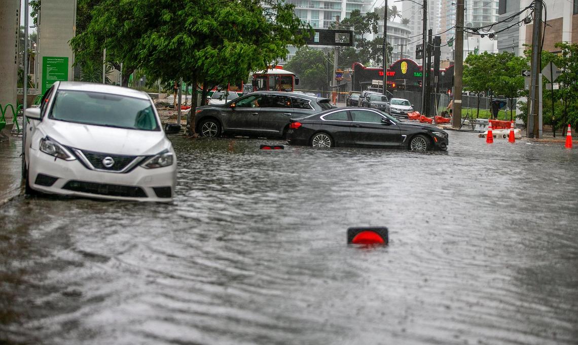 Massive rainfall from a disturbance caused serious floods leaving cars and businesses flooded Saturday morning in the Brickell area near downtown Miami on Saturday June 04, 2022.