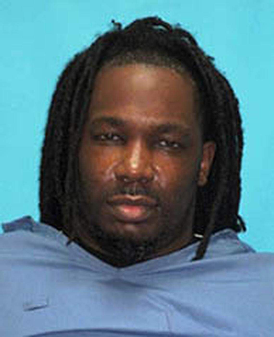 Sex trafficker Julius Mozie as he went onto probation for robbery in 2020