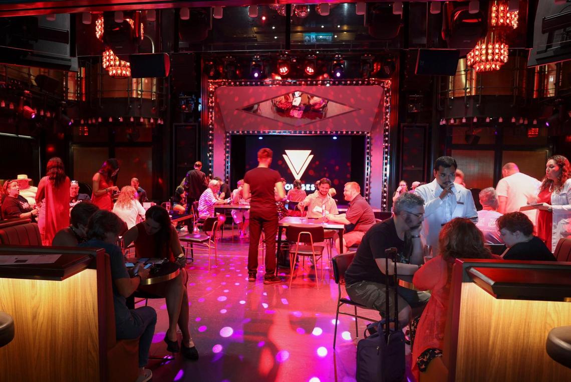 People enjoy a daytime event at a nightclub called Extra Virgin on Virgin Voyages’ new ship Valiant Lady on Sunday, Oct. 30, 2022, at Port Miami.