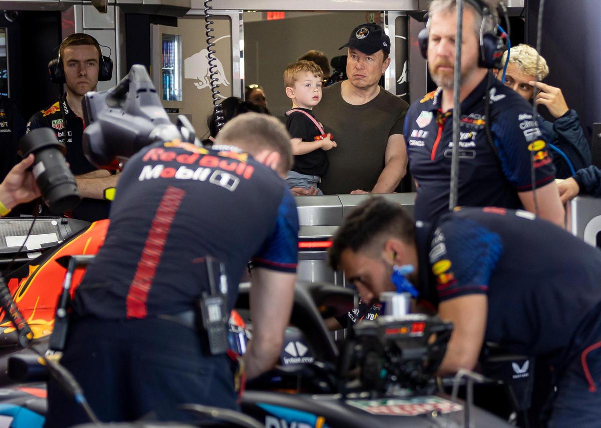 Elon Musk watches as Mexican Formula One driver Sergio Perez of Red Bull Racing gets ready for the third practice session at the Formula One Miami Grand Prix at the Miami International Autodrome on Saturday, May 6, 2023, in Miami Gardens, Fla.