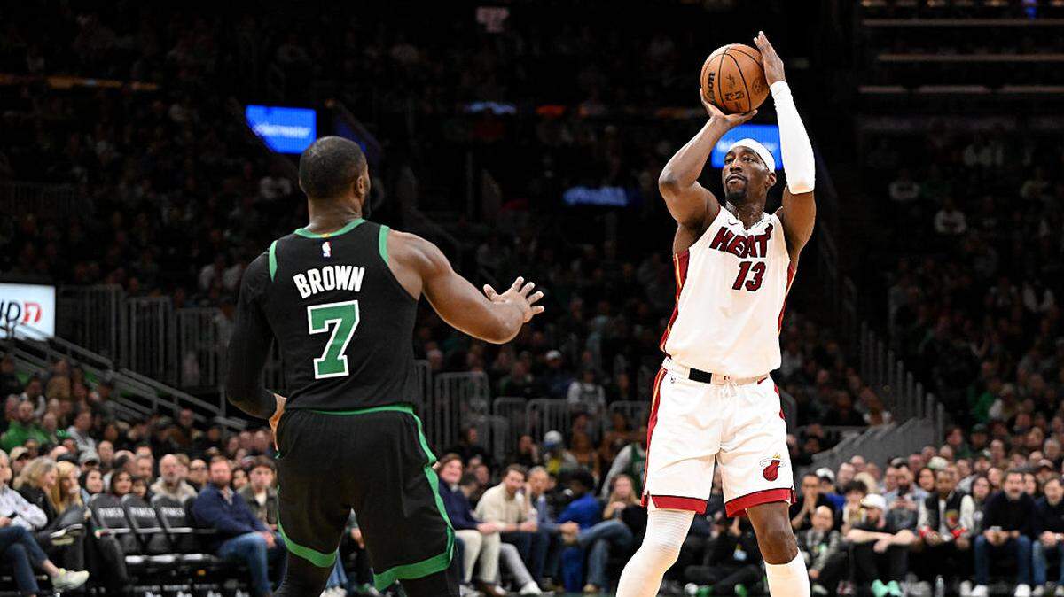 Bam Adebayo #13 of the Miami Heat attempts a basket against Jaylen Brown #7 of the Boston Celtics during the first half at the TD Garden on February 06, 2026 in Boston.