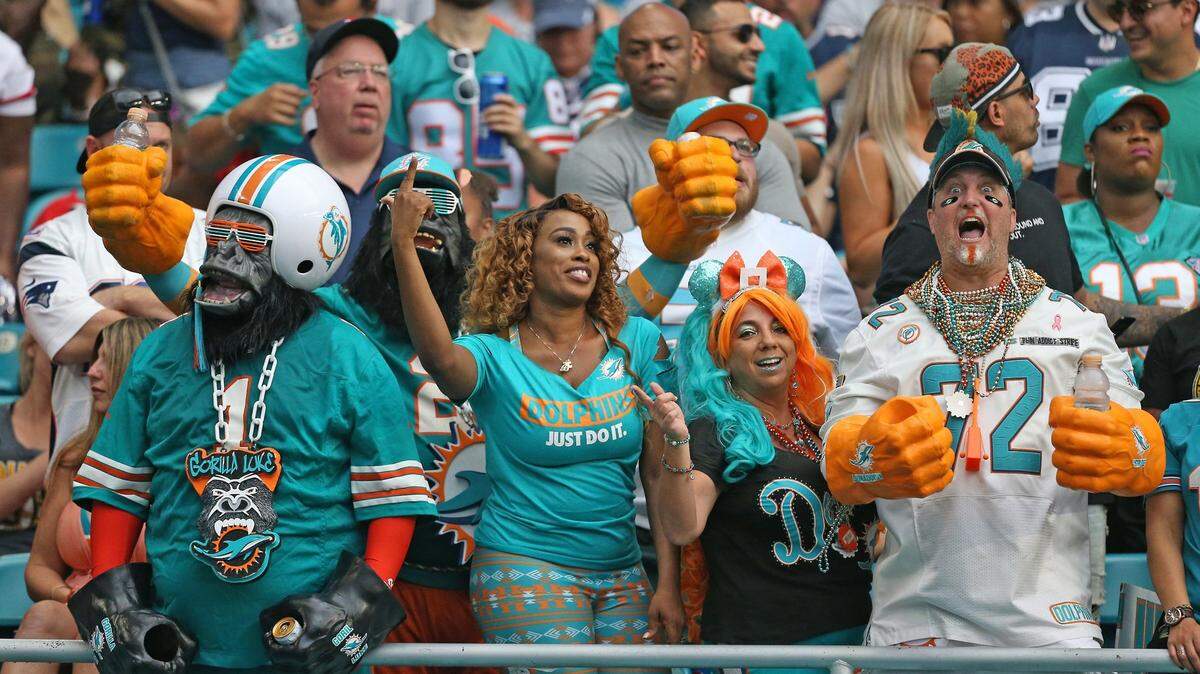 Miami Dolphins showing their support during third quarter of an NFL football game against the New England Patriots at Hard Rock Stadium on Sunday, December 9 2018, in Miami Gardens.
