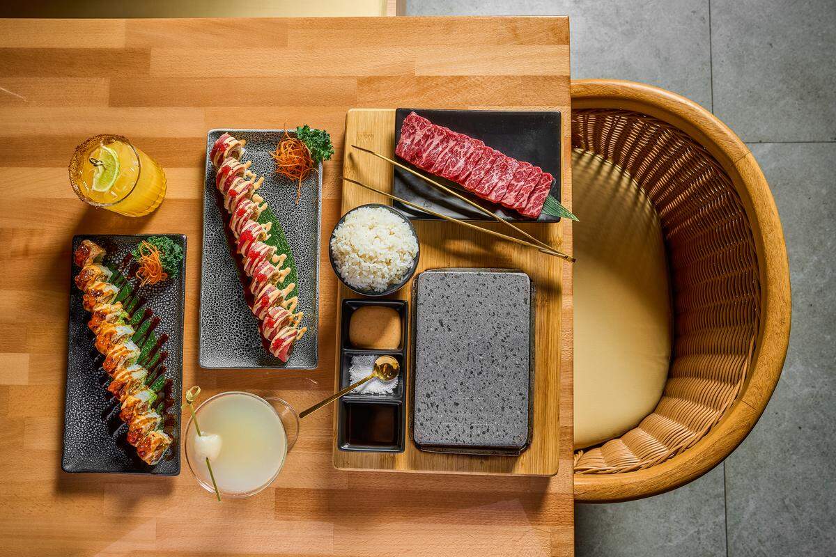 Sushi rolls and the hot stone wagyu beef entree at Tokyo Tuna in South Miami.