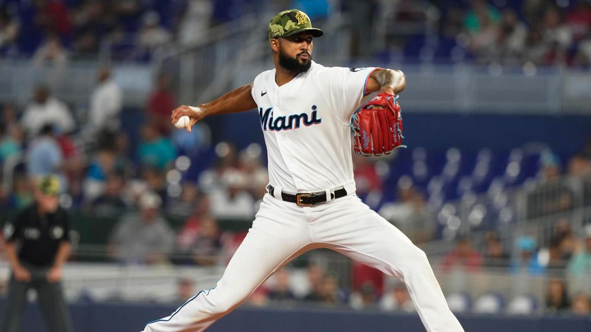 Miami Marlins starting pitcher Sandy Alcantara (22) winds a pitch during the first inning of a baseball game against the Atlanta Braves, Sunday, May 22, 2022, in Miami. (AP Photo/Marta Lavandier)