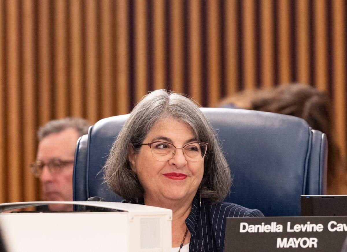 Mayor Daniella Levine Cava smiles after speakers talk in support of the budget during the final Miami-Dade Budget hearing before a vote on Tuesday, Sept. 20, 2022, at the Stephen P. Clark Center in downtown Miami.