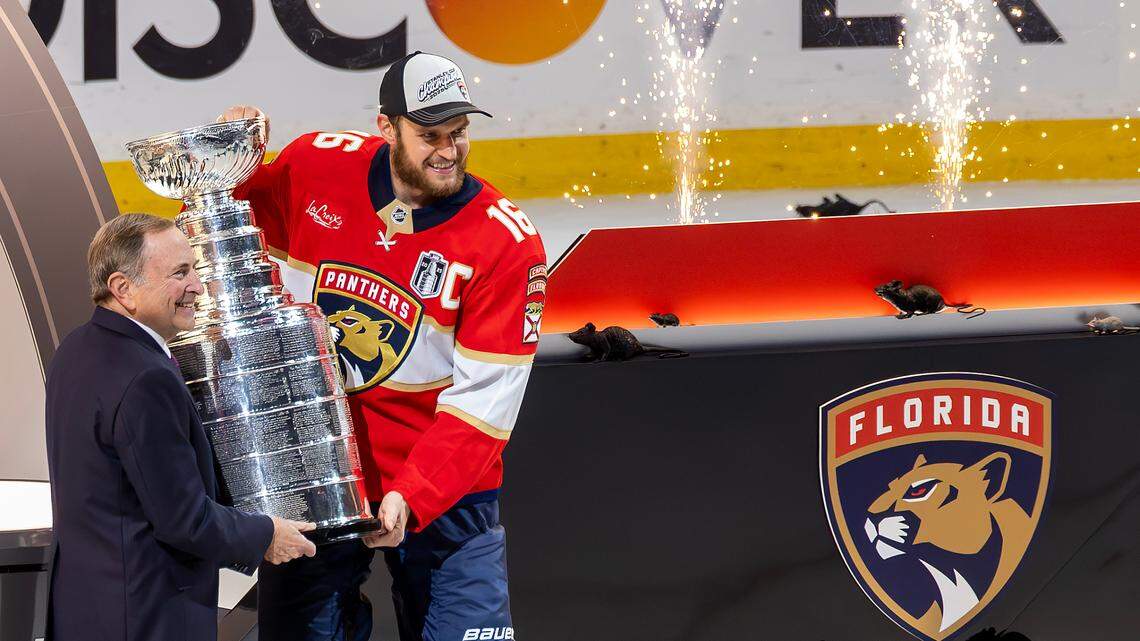 NHL Commissioner Gary Bettman presents the Stanley Cup to Florida Panthers center Aleksander Barkov (16) after a 5-1 victory over the Edmonton Oilers in Game 6 of the Stanley Cup Final at Amerant Bank Arena on Tuesday, June 17, 2025, in Sunrise, Fla., clinching the NHL championship.